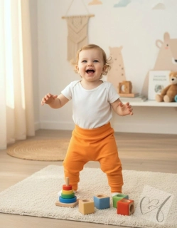 Rostoucí dětské kalhoty  baggy  – meruňkové